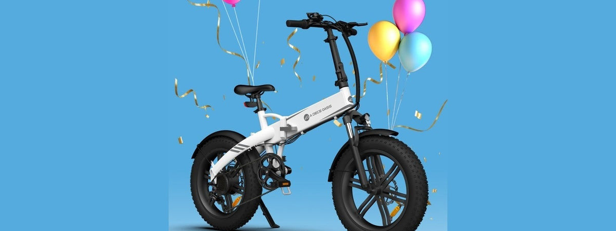 Giftcard de E-Mobility con una bicicleta eléctrica y globos de celebración - E-Mobility Chile